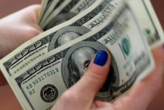 US dollar edges down amid coronavirus uncertainty