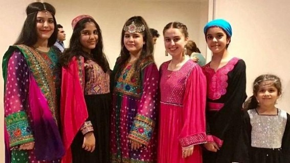 Afghan women protest Taliban's hijab diktat by sharing photos in colourful dresses