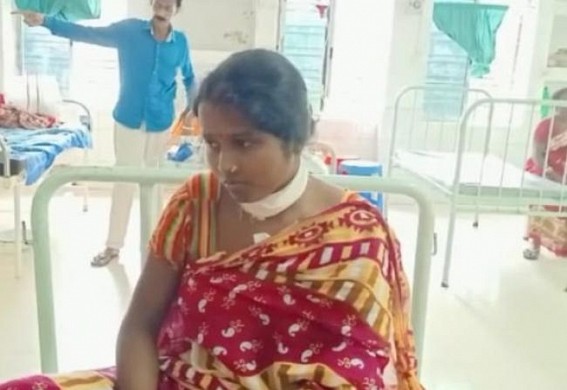 Husband stabbed wife on neck with blade in Belonia sub-division Husband stabbed wife on neck with blade in Belonia sub-division