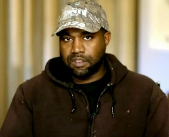 Kanye West throws pap's phone in the middle of the street