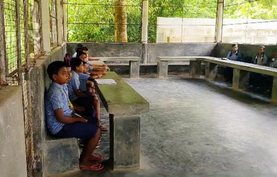 Either Summer Waves Or Storms : Lack of Classrooms, Benches force Students to Sit in Mid-Day-Meal Hall in Belonia Kukichara School Either Summer Waves Or Storms : Lack of Classrooms, Benches force Students to Sit in Mid-Day-Meal Hall in Belonia Kukichara School