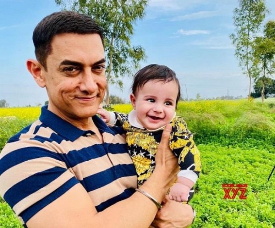 Aamir cuddles Gippy Grewal's son, pic goes viral Aamir cuddles Gippy Grewal's son, pic goes viral