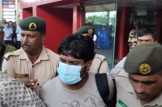 Wanted Criminal Raju Barman brought to Tripura ; Tension erupted as BJP supporters gathered in MBB Airport Wanted Criminal Raju Barman brought to Tripura ; Tension erupted as BJP supporters gathered in MBB Airport